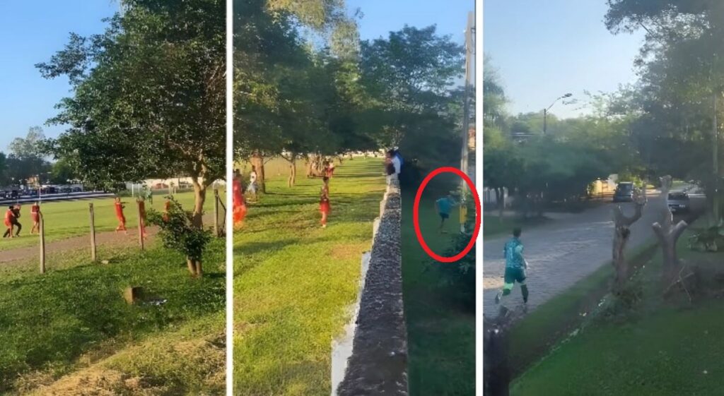 Jugadores de General Brugués persiguen a un hincha crítico durante un partido en Paraguarí, Paraguay.